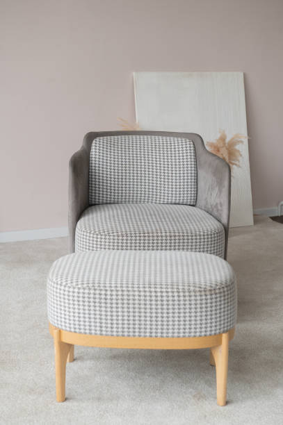 istock Patterned Armchair with Ottoman in Modern Interior Design 2166991292