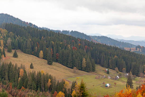 Panoramic autumn views, city, mountains and Hills