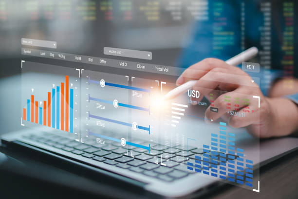 istock Business people interacting with laptops, featuring stock tickers or graphs, cryptocurrency and new trading platforms, ideas and perspectives, Stock investment, New technology 2166996455