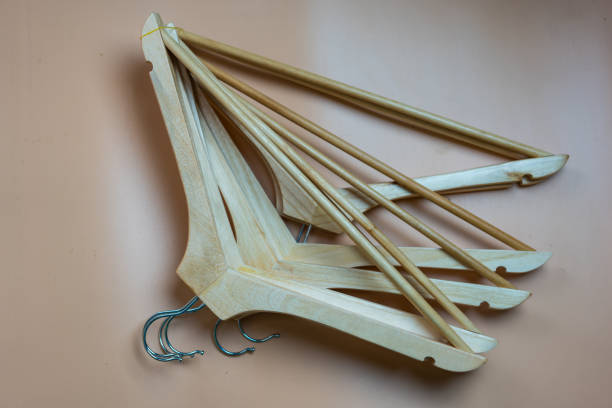 istock Classic wooden coat hanger for clothes 2166996787