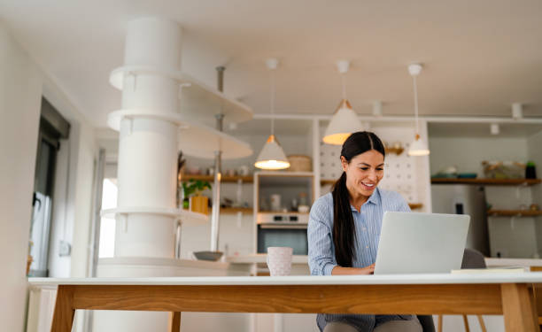 istock Young beautiful woman using computer to check social media, working or read emails. 2166998046