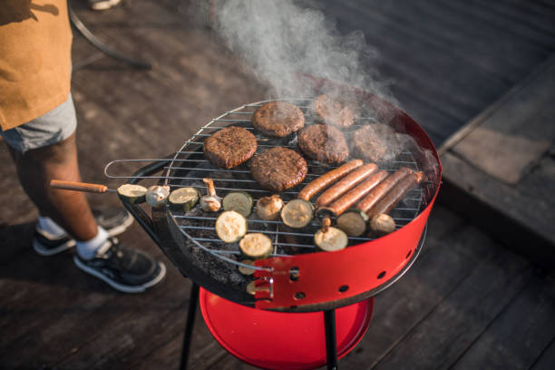 istock An unrecognizable black man is grilling outdoors 2166998156