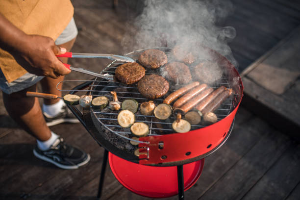 istock An unrecognizable, young black man is grilling outdoors 2166998837