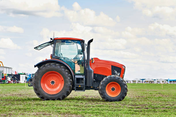 istock Tractor on agricultural field 2166999343