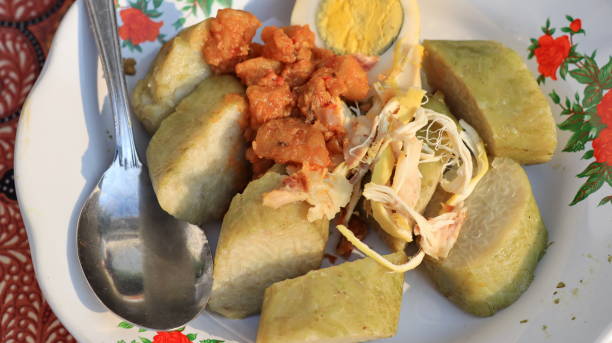istock Lontong sayur. Rice cake with vegetable curry and spicy boiled egg 2166999890