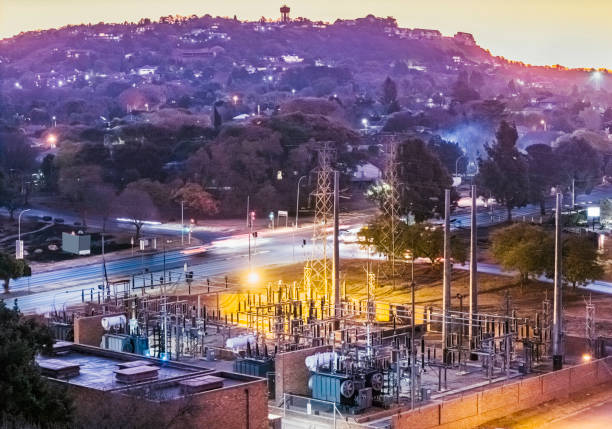 Electricity substation seen in the evening sunset in the valley, providing electrical power to the households.