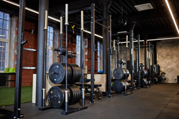 istock Weight Training Sports Club Interior with Exercise Machines 2167003432