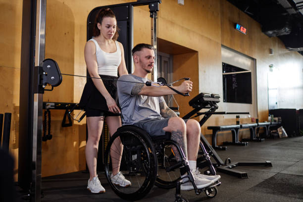 istock Man with Disability Training in Sports Club 2167003731