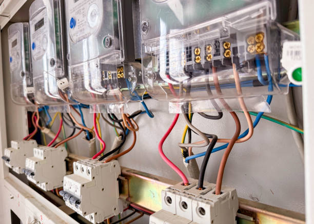 istock Electrical circuit breaker panel with multi-colored wires and switches. 2167006844