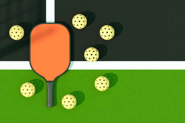 Pickleball racket and balls on court with net shadow. Digitally generated image. 3d render.
