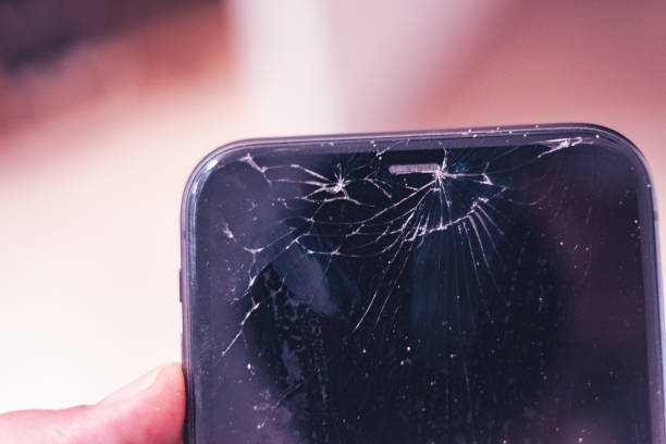 istock Broken screen glass in a mobile smartphone close up 2167009492