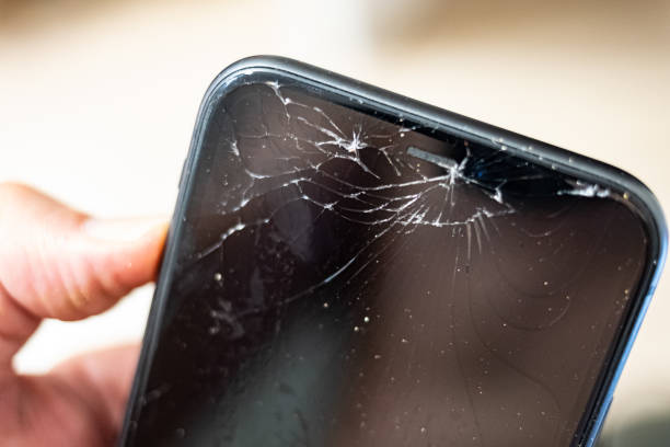 istock Broken screen glass in a mobile smartphone close up 2167009521