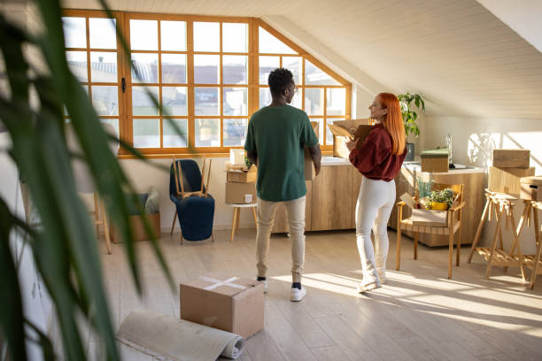 istock Young couple moving into a new apartment 2167013463