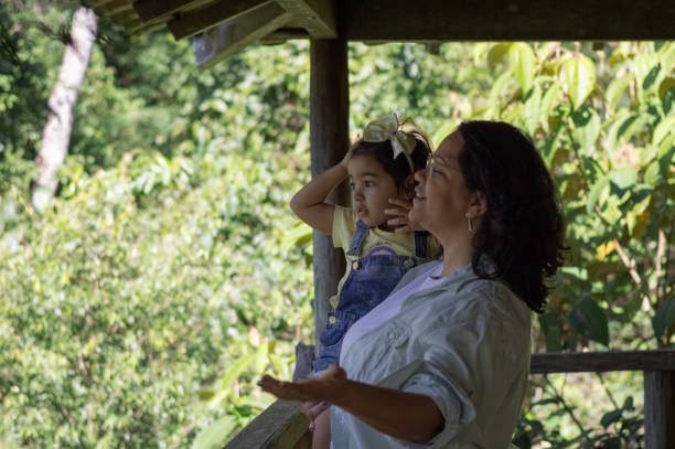 istock Observation tower in the Amazon rainforest. Journey between mother and daughter. 2167014225