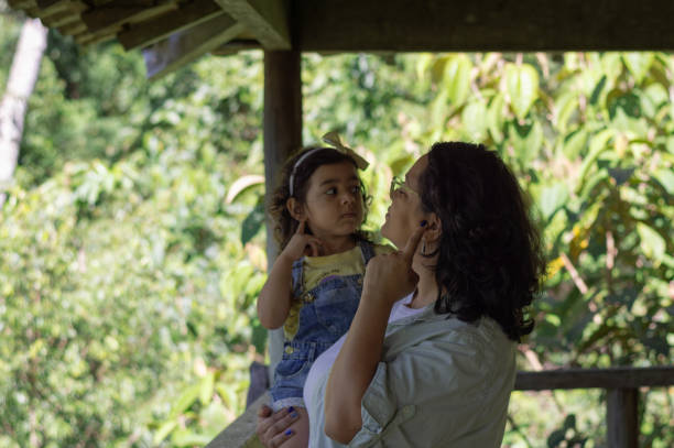 istock Observation tower in the Amazon rainforest. Journey between mother and daughter. 2167014857