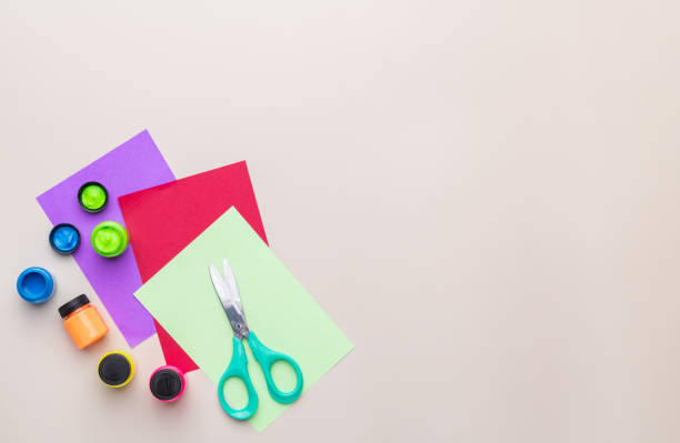 istock Back to school backdrop. School supply over light brown background with copy space 2167017185