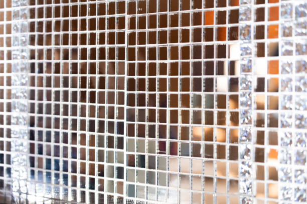 istock Wall background decorated with glass, beautiful mosaic wall interior design, using bokeh light effect 2167019343