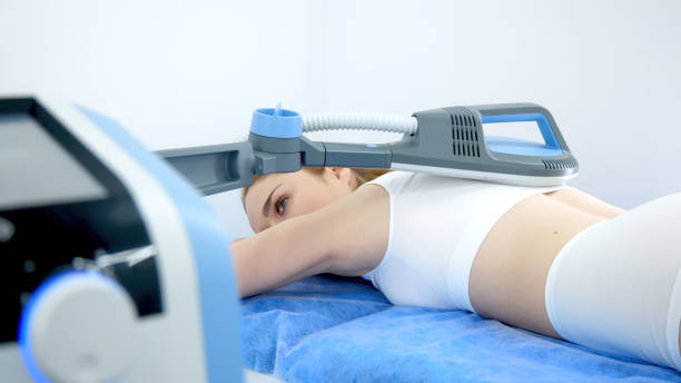 istock A young woman undergoing advanced superinductive magnetic therapy in a modern clinic. Perfect for highlighting cutting-edge medical treatments and wellness innovation. 2167019871