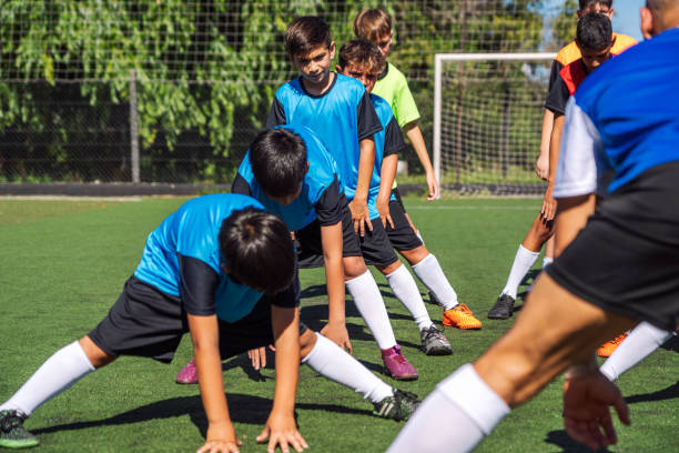 istock Youth Soccer Team Stretching Before Outdoor Practice Session 2167020306