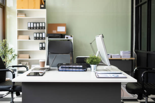 istock workspace area with laptop tablet smartphone and paperwork on the table in the office concept. 2167020351