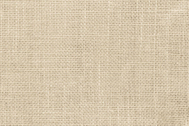 istock Brown sackcloth woven texture background in natural pattern. Jute hessian burlap, linen background in light beige cream color blank. Weaving canvas fiber line cotton cloth textured as organic. 2167020412