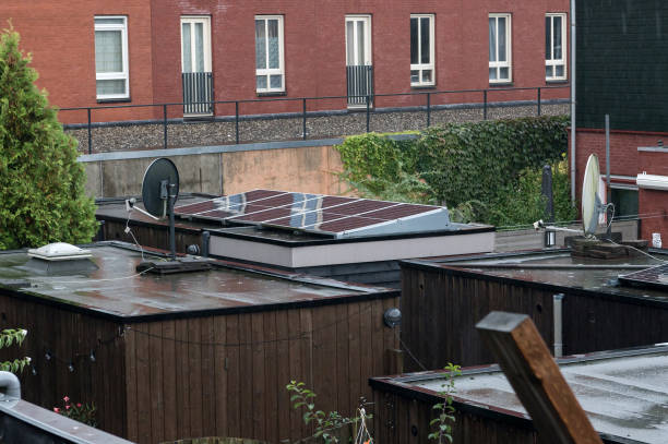 istock Suburban Rooftops with Solar Energy Panels 2167022056