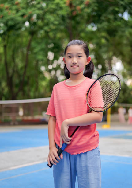 istock Little girl with badminton racket 2167022957