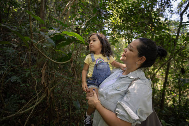 Mother and daughter on an ecotourism trip in the Amazon rainforest.