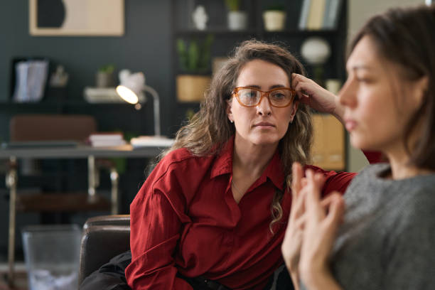 istock Counselor Listening to Client in Office Setting 2167024426