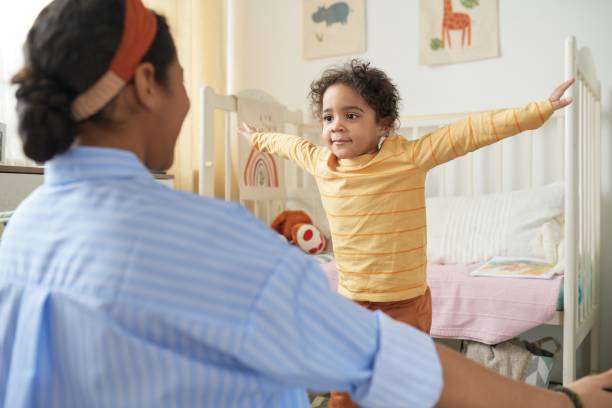 istock Child Reaching for Hug and Embracing Parent 2167025986
