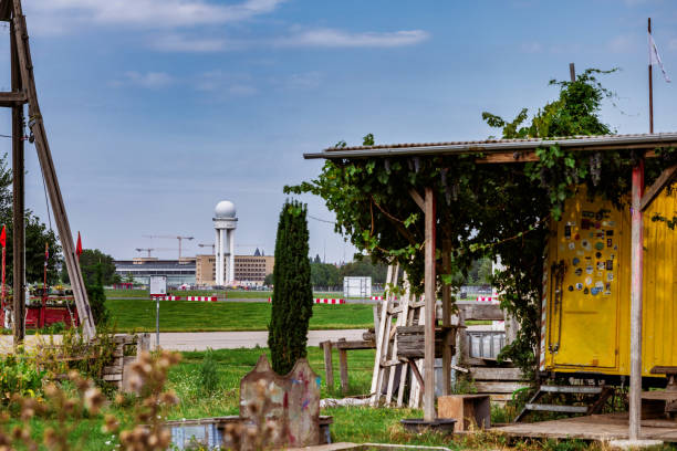 urban garden in Berlin at Tempelhofer Feld, the tower and buildings in the background