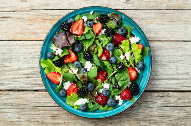 istock Berries salad (blueberry strawberry blackberry ) with cheese feta and balsamic sauce 2167028065
