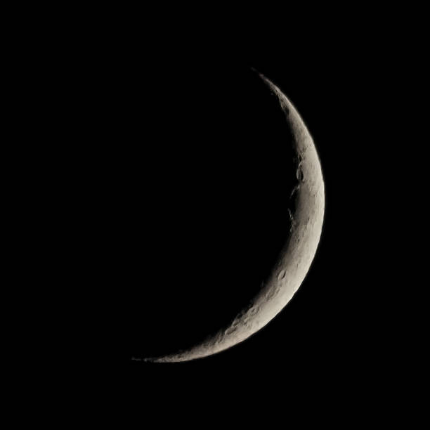 istock Waxing crescent moon seen with telescope 2167029240