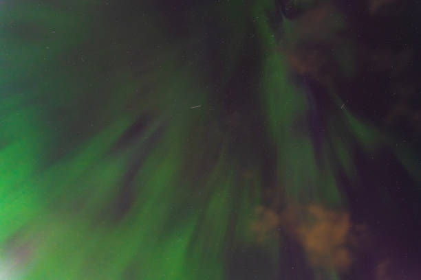 istock Night scene, starry sky, clouds and northern lights. 2167032585