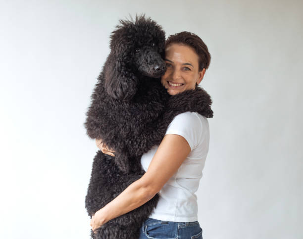istock Woman and Poodle 2167032884