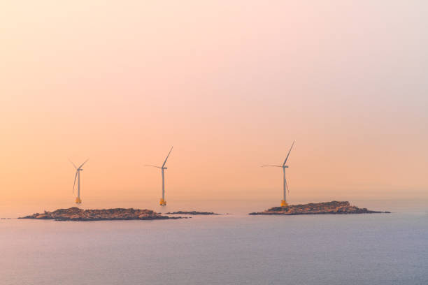 istock Offshore wind farm in the sea at sunset. 2167037610