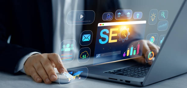 istock Business person who using a computer for analysis SEO. Attract organic traffic,boost visibility and dominate search engine ranking.Search engine optimization marketing and online traffic on website. 2167039686