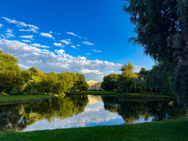 View of the Summer Palace of Emperor Paul I in Pavlovsky park from the Slavyanka River on a sunny summer day, Pavlovsk, Saint Petersburg, Russia