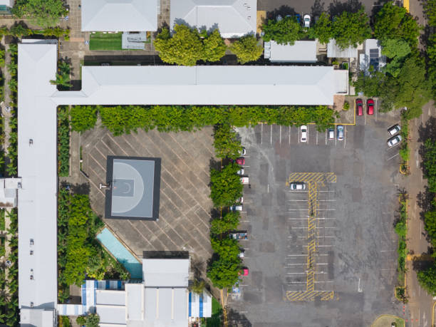 istock Basketball field next to parking lot 2167042551