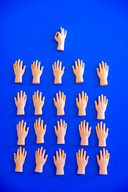 Leader concept. Help, assistance, harmony, diversity concept; tiny finger hands.