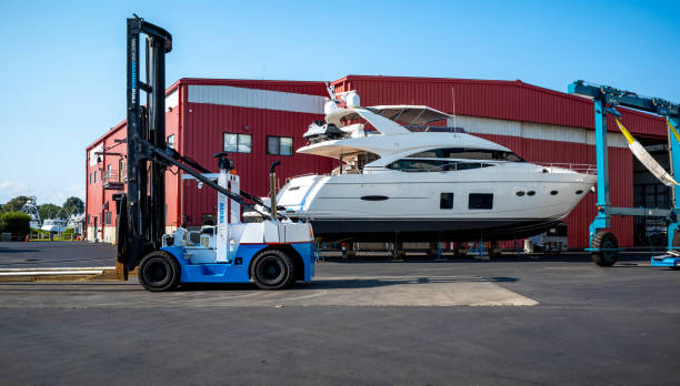 Views of the very busy Falmouth marina and boat yard in Falmouth, MA on Cape Cod.  The boat yard repairs boats, refuels them and moors them.  Yachts of all sizes enter the harbor and moor at the marina.