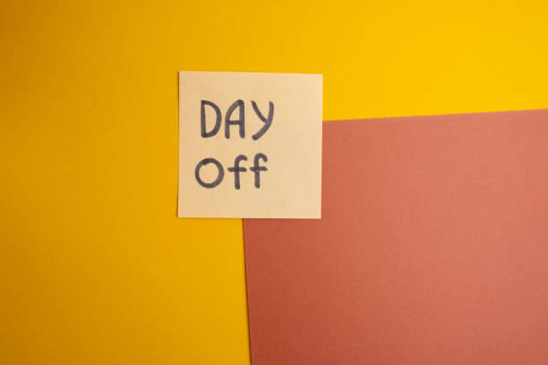 istock Day off - workplace message in the office. Concept of absence from work and day off 2167057784