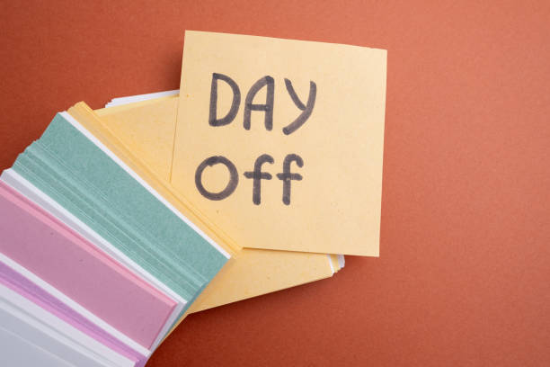 istock Day off - workplace message in the office. Concept of absence from work and day off 2167057786