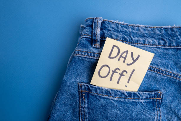 istock Day off - workplace message in the office. Concept of absence from work and day off 2167058028