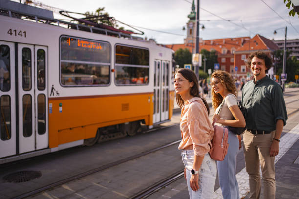 istock Friends waiting for a tram in Budapest during a sunny afternoon 2167059674