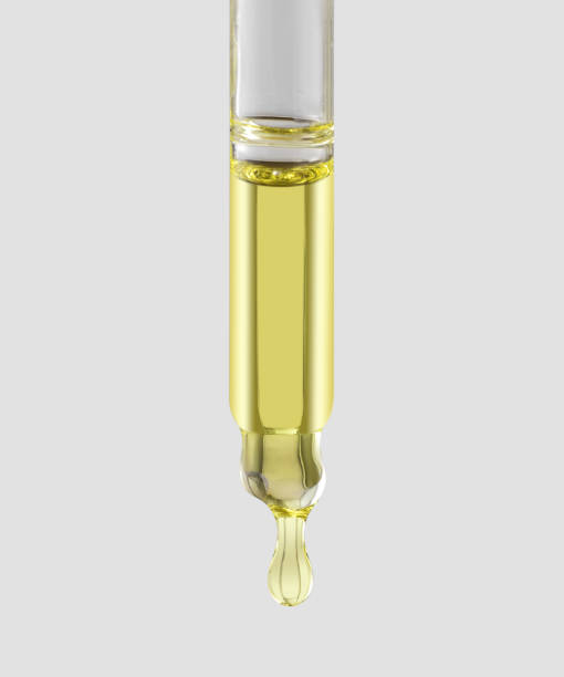 istock Transparent pipette with serum on a gray background. 2167059847