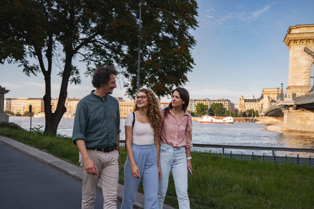 istock Friends walking along the Danube River in Budapest on a sunny day 2167059913