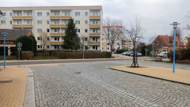 istock A charming cobblestone street features a lovely building in the background 2167062730