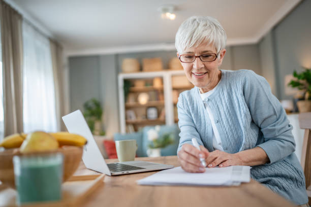 istock Senior caucasian woman use laptop computer at home for work 2167065042