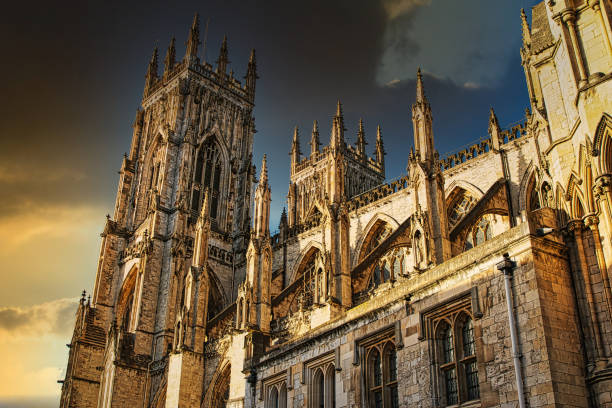 istock Majestic Gothic cathedral against a dramatic sky at sunset, showcasing intricate architecture and historical grandeur in York, UK. 2167065324